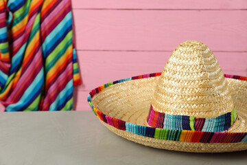 Mexican sombrero hat on grey table, closeup. Space for text - 756382735