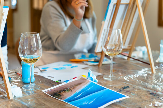 Art and Wine workshop. Glasses of white wine to enjoy the painting workshop.
