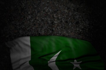 wonderful dark picture of Pakistan flag with large folds on dark asphalt with free space for your text - any feast flag 3d illustration..