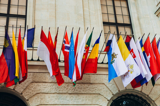 National flags of various countries flying in the wind. Colorful flags from different countries. Flags Organization for Security and Co-operation in Europe