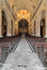 Fototapeta premium Interior of the 15m wide central nave, AD 1748-1777 built Catedral de San Cristobal Cathedral Church, empty of churchgoers. Old Havana-Cuba-070