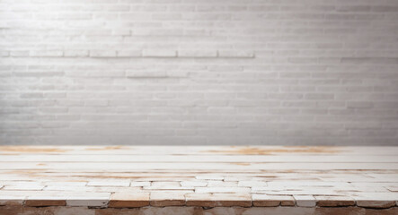 Brick floor surface with white blurred brick wall background. Image template for product display.
