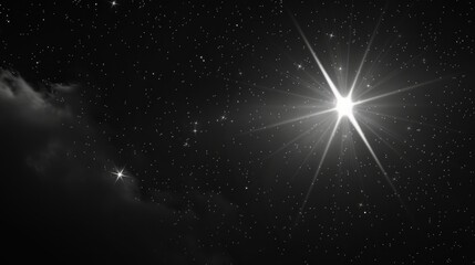 A timeless black and white photograph showcasing a luminous star set against a deep, dark backdrop.