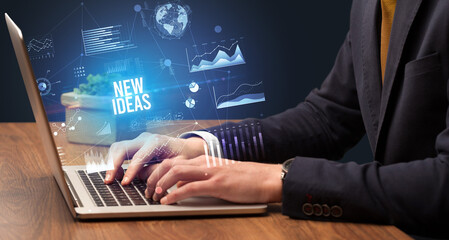 Businessman working on laptop, business concept