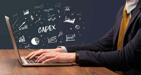 Businessman working on laptop, business concept