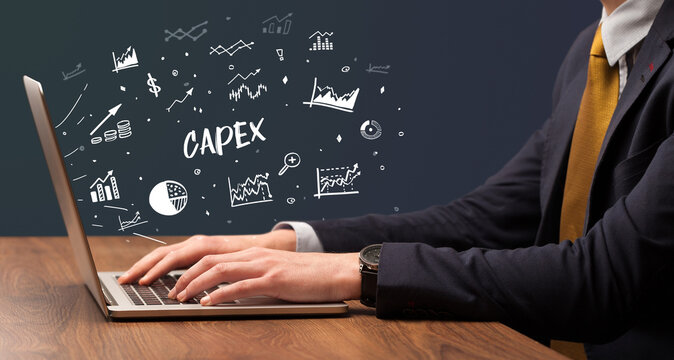 Businessman working on laptop, business concept