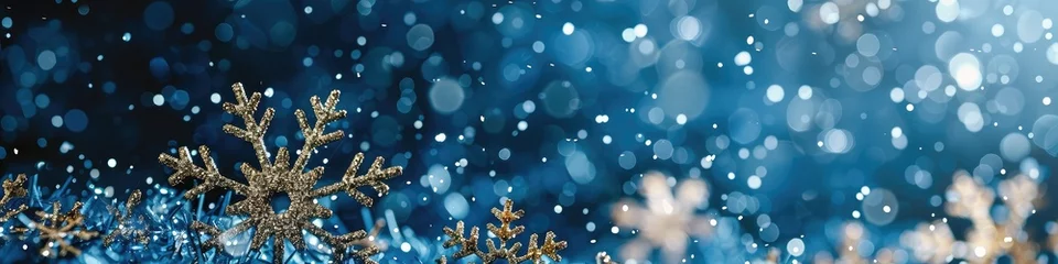 Fotobehang Glittering snowflakes delicately suspended in mid-air sparkle against a midnight blue backdrop, creating a magical winter wonderland with room for your words. © Fahad