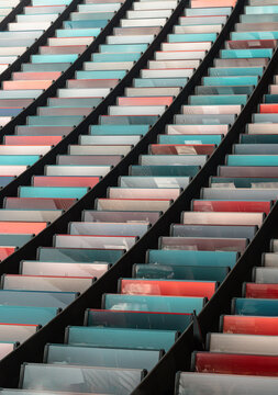 Colourful panels on the exterior on Modern architecture of Mizuho bank office building (2 New Ludgate) in city of london. Abstract multi coloured modern architecture, Block windows, Space for text.