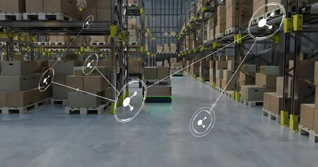 Animation of network of connections with icons over machines working in warehouse - Powered by Adobe