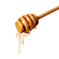 Natural honey dripping from dipper on white background