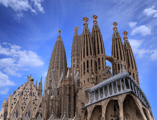 Passion Façade of the Sagrada Família with a cloudy sky in Barcelona, Spain.	