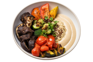 Vegetarian Buddha Bowl with quinoa, black beans, roasted vegetables and hummus Topped with rich tahini salad dressing. Isolated on transparent background.