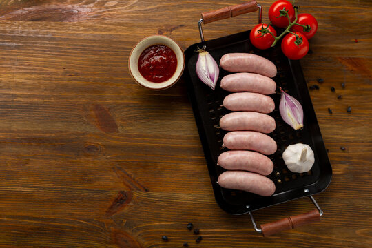 top view of raw  sausages for grill bbq