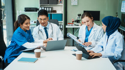 A diverse group of healthcare professionals, including doctors, nurses, and specialists, engaging in a collaborative meeting to discuss medical cases and share expertise in a hospital