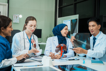 A diverse group of healthcare professionals, including doctors, nurses, and specialists, engaging in a collaborative meeting to discuss medical cases and share expertise in a hospital
