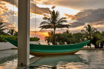 Fishing boat in water pool near beach at sunset. Sri Lanka. - 756430133