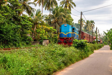 Train goes across village and forest, Sri Lanka. - 756430361