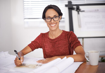 Happy woman, portrait and architect with blueprint for construction, design and engineering at...