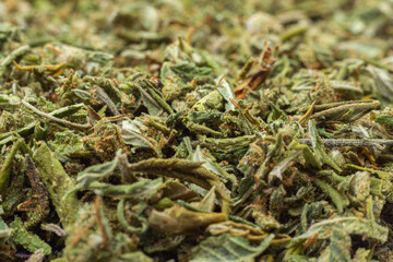 Dry cannabis leaves mix for smoking texture