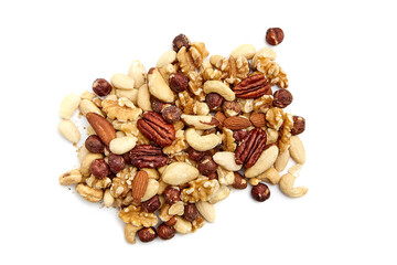 Extreme close-up showcasing the textures and variety of mixed nuts isolated on white background