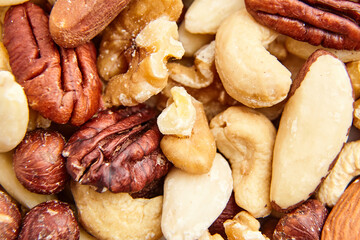 Extreme close-up showcasing the textures and variety of mixed nuts