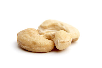 Fototapeta na wymiar A small heap of raw cashew nuts set isolated on a white background