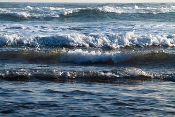 waves breaking the beach