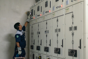 Electrician visual check main distribution board cabinet,technician predictive or preventive maintenance power electricity system.