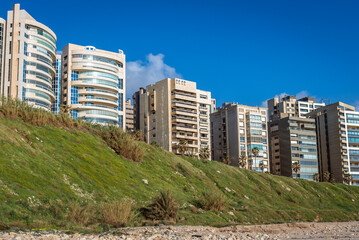 Fototapeta premium Residential buildings over Ramlet al Baida beach on Mediterranean coast in Beirut capital city, Lebanon