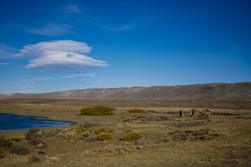 Historic ruins on a rural field under a blue sky in Patagonia, Argentina