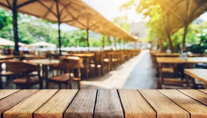 Fotobehang wooden table background blur cafe view © Francesco