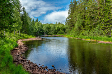 Summer view of the river Ogstrommen in Sweden