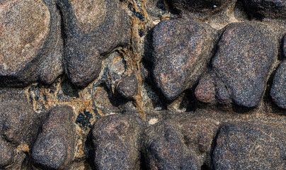 natural rock design in beach  background texture 