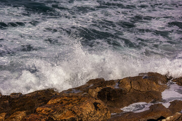 waves crashing on rocks