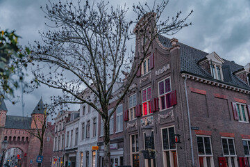 Amersfoort Netherlands, March 26 2023: Fairy tale urban landscape of the historic city of Amersfoort in rainy weather in the spring season