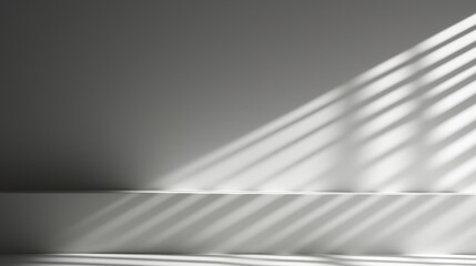 Grey background for product presentation with shadow and light from windows. White room interior
