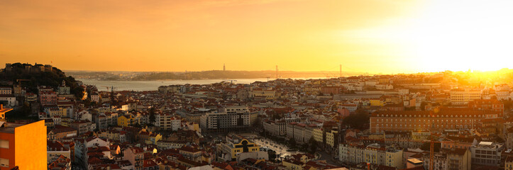 Lisbon sunset high res panorama photo. Amazing panorama video from a mirador viewpoint in Lisbon during a spring sunset. Travel to Portugal.