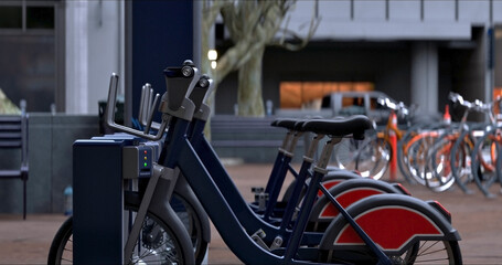 Generic Electric bicycle charging station. Shared electric bikes parked for rent on city street - 756522141