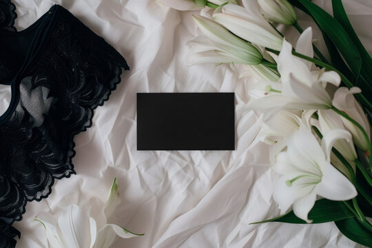 Business card mockup lingerie mockup floral, lingerie branding textile background elegant design, black bra on white background.