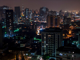 Obraz premium Aerial night skyline view of buildings in Sao Paulo downtown city, Brazil