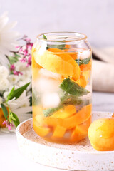 refreshing summer drink with oranges and apricots