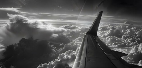 Tail fin against the clouds stability and control - obrazy, fototapety, plakaty