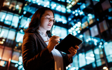 businesswoman using tablet pc