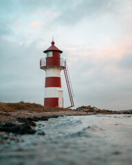 Leuchtturm am Strand Sonnenuntergang