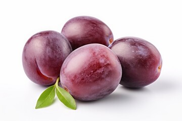 purple plum isolated on a white background. violet fruit, a bunch of berries with leaves.