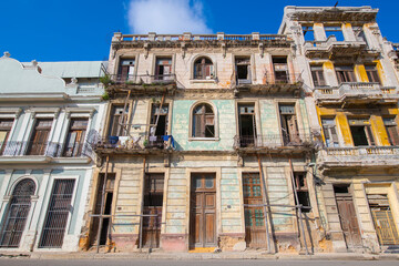Historic buildings on Calle Industria Street at Calle Barcelona Street next to Capitolio in Old Havana (La Habana Vieja), Cuba. Old Havana is a World Heritage Site. 