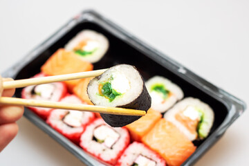 Bright beautiful rolls with fish close up