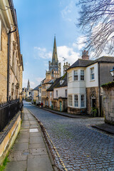 Obraz premium A view down Barn Lane towards the town centre in Stamford, Lincolnshire, UK in springtime