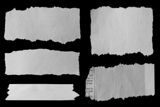 Five pieces of torn paper on black background