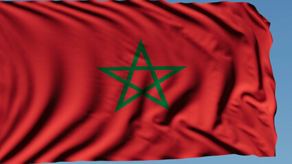 Close-up of the national flag of Morocco flutters in the wind on a sunny day